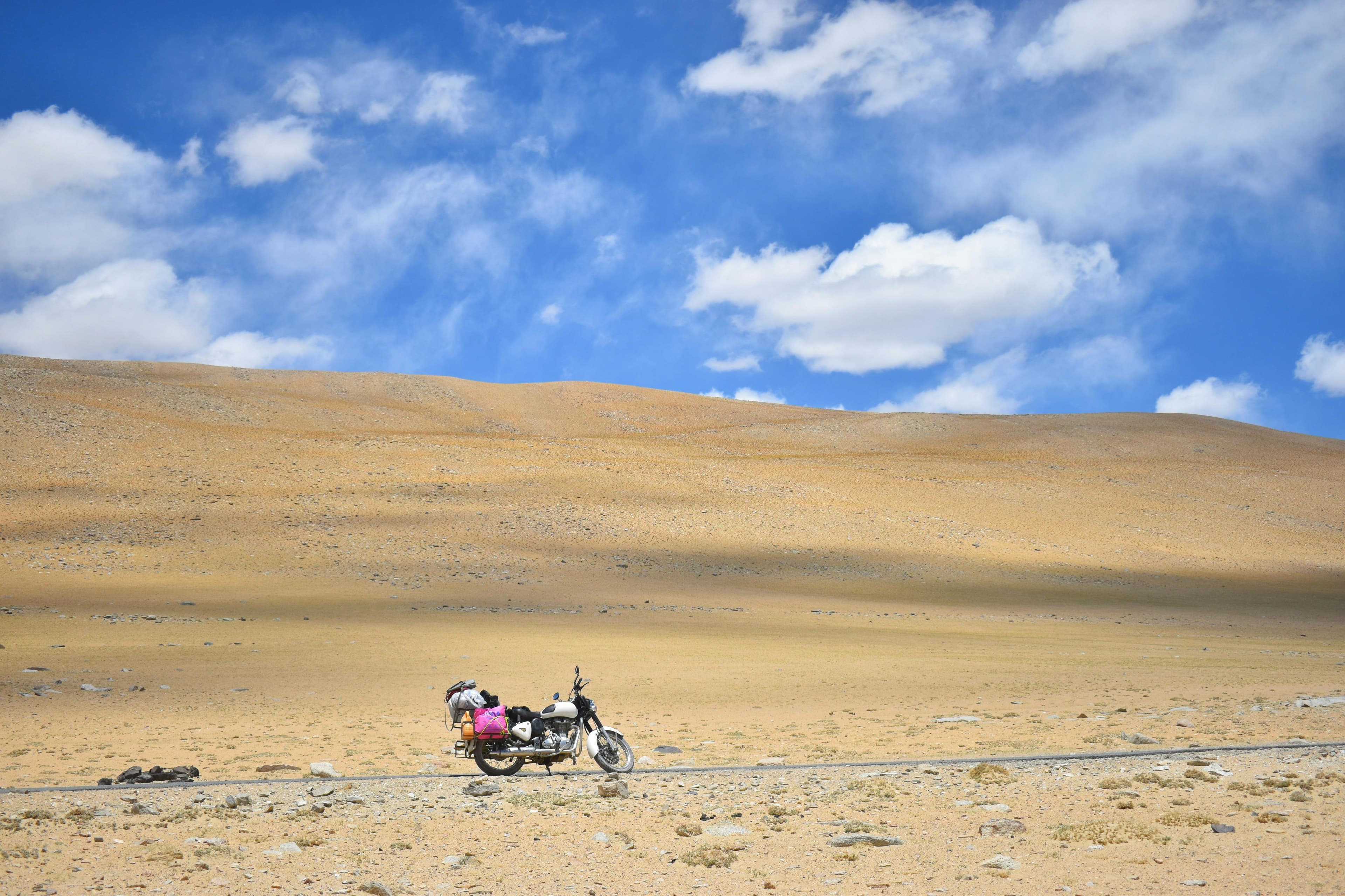 Motorcycle riding through Himalayan mountains