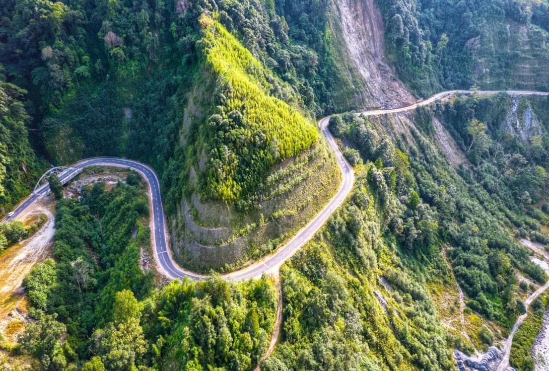 Conquer Mayodia Pass (9,000 ft) into the sheer canyons of the Dibang Valley.